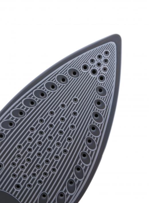 The bottom of an iron with a Teflon® coating.