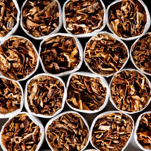 Tobacco leaves contain small amounts of polonium, which emits alpha particles.