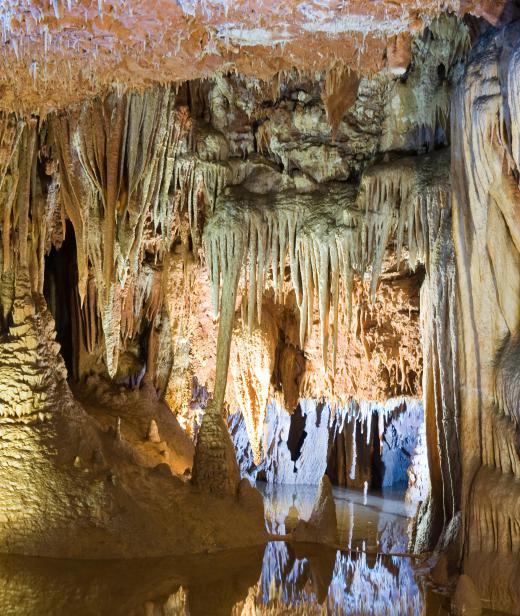 Stalactite formation in caves is one form of crystal formation that takes places over many centuries, possibly longer.