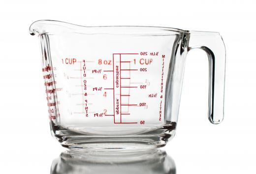 A fluid ounce can be measured by using a glass measuring cup.