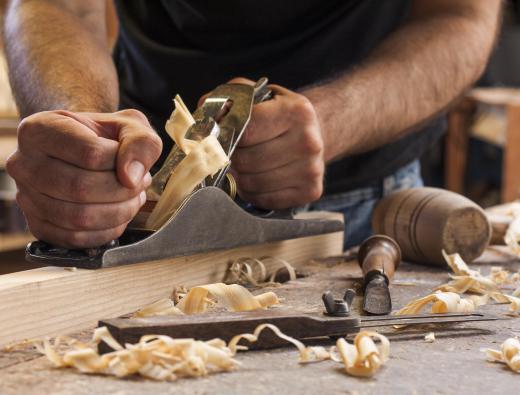 A man who feels comfort at the smell of wood and whose father spent a great deal of time teaching him woodworking in the past may be experiencing a conditioned response.