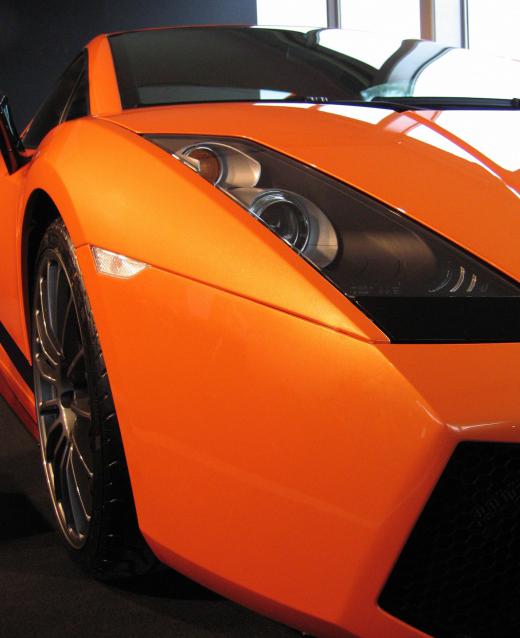 Supercars are generally considered a higher-ranking vehicle -- both in terms of cost and speed -- than sports cars.