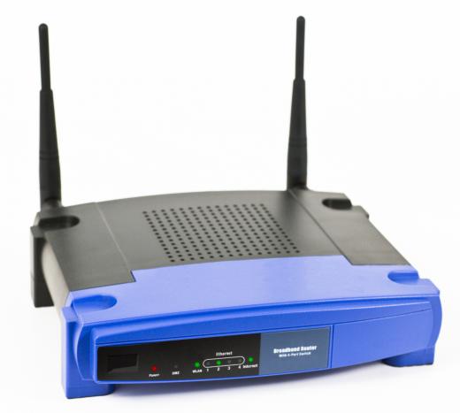 A wireless router with dipole antennas.